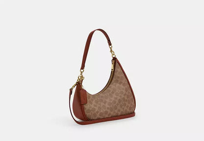 Twisted Teri Shoulder Bag In Signature Canvas
