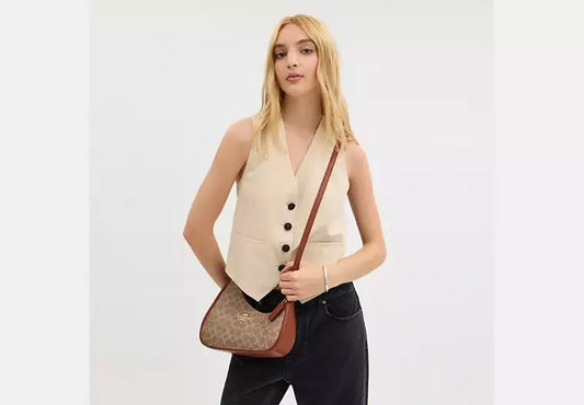 Twisted Teri Shoulder Bag In Signature Canvas