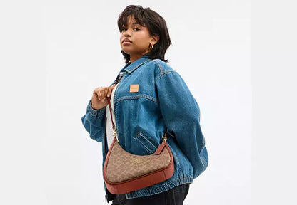 Twisted Teri Shoulder Bag In Signature Canvas